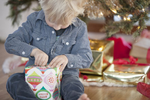 Christmas - child with gift - lightstock_109924_medium_user_8104670