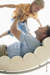 Father Playing with Son --- Image by © Royalty-Free/Corbis