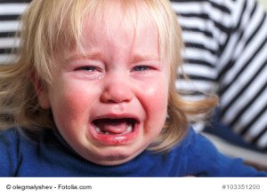 crying tears toddler with blond hairstyle