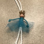 Doll necklace blue